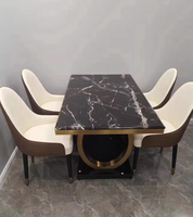 Ensemble de table et de chaises à manger en marbre moderne avec structure en métal pour la salle à manger à domicile