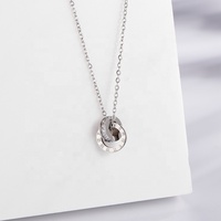 Collier pendentif cercle pour femme Byron, design double cercle romain en zircon, chaîne à maillons en alliage d'acier inoxydable plaqué or, mignon