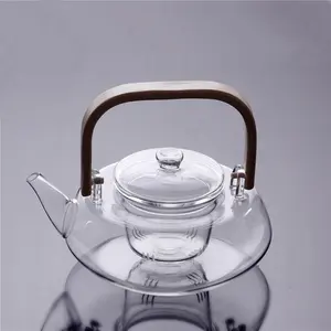 手工制作日本风格耐玻璃茶壶，带竹柄定制标志