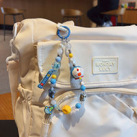 Mignon Doraemon Porte-clés Couple Porte-clés Kawaii Dessin Animé Bowknot Téléphone Chaîne Sac Coeur Pendentif Charme Sac À Dos Décoration Cadeau