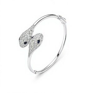 Bracelet double tête de serpent en argent sterling avec micro-incrustation de moissanite yeux bleus pour femme - Product Image 1