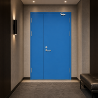 Porte coupe-feu robuste en acier bleu avec ferme-porte automatique et cadre en acier pour quai de chargement logistique