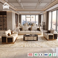 Ensemble de meubles sur mesure pour toute la maison, canapé en cuir de luxe avec table basse en marbre, décoration en métal doré pour projet de villa haut de gamme