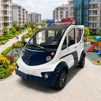 Voiture de patrouille électrique fermée JINWO 4 places, moteur 4000W/7000W en option, bus de sécurité et de tourisme anti-poussière pour hôtels et complexes hôteliers