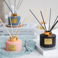 Bouteille en verre de parfum de maison de luxe de couleur personnalisée 50ml 100 150 200 500 Bouteilles vides de diffuseur d'arôme à roseaux avec boîte