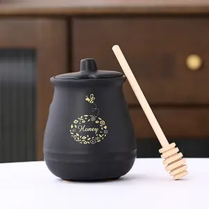 Pot à miel en céramique noir et blanc mat avec couvercle et bâton de miel anti-plongeur