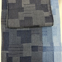 Tissu en denim jacquard à motifs géométriques pour jeans, vestes, jupes et vêtements de mode