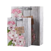 Sac en papier personnalisé de luxe imprimé floral avec votre propre logo, fabriqué en Chine