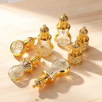 Flacon compte-gouttes en verre pour huile essentielle 15 ml avec logo personnalisé, bille roulante dorée électroplaquée et bouchon à vis scellable anti-UV
