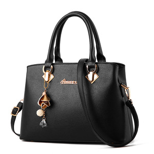 Bolsos de Mano y Carteras de Cuero PU para Mujer de Gran Capacidad y Alta Calidad, Bolso de Mano con Correa Larga y Borla - Product Image 1