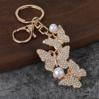 Porte-clés de luxe en forme d'étoile de mer dorée avec perles et cristaux, breloque de sac, pendentif, thème plage estivale, accessoire de bijouterie pour cadeau