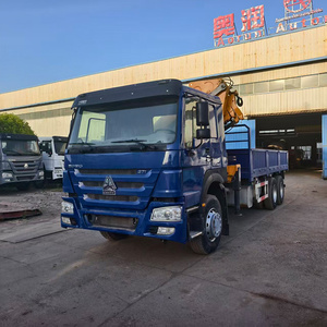 Camion <span class=keywords><strong>benne</strong></span> basculante <span class=keywords><strong>d</strong></span>'<span class=keywords><strong>occasion</strong></span> HOWO 371 ch à prix réduit avec flèche télescopique pliante pour l'Afrique - Product Image 1