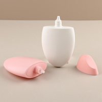 Bouteille en plastique PET rose mignonne en forme d'œuf 50 ml pour crème solaire avec bouchon à vis sérigraphié, légère et portable