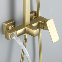 Système de douche mural de luxe en or brossé avec robinetterie apparente pour salle de bain