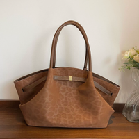 Sac à main en daim de luxe pour femme, sac fourre-tout, nouvelle conception française, motif léopard, en stock, Alibaba 2026