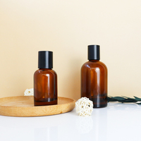 Flacons de parfum élégants en verre brun 30ml 50ml 100ml avec capuchon noir et pulvérisateur à sertir, logo personnalisé pour diffuseur