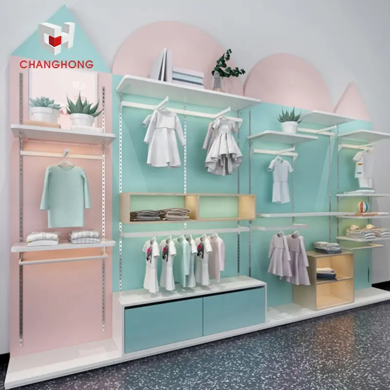 Semplice baby shop design scaffalature al dettaglio abbigliamento adorabile negozio per bambini espositore scaffale espositore da parete a doghe con armadio