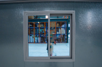 Maison conteneur extensible grise de 20 pieds, vidéo, double aile, étanche, préfabriquée, pour bureau de chantier et stockage