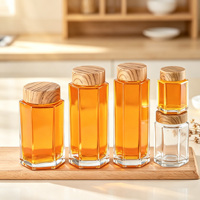 Vente en gros usine : Bouteilles de miel hexagonales avec couvercle imitation bois, Bouteilles en verre, Bocaux scellés, Bocaux à confiture et Bouteilles pour conserves