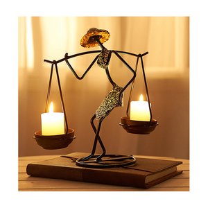 Strongwell portacandele nordico candeliere in metallo personaggio astratto scultura Decor decorazione della casa Art Gift candeliere - Product Image 1