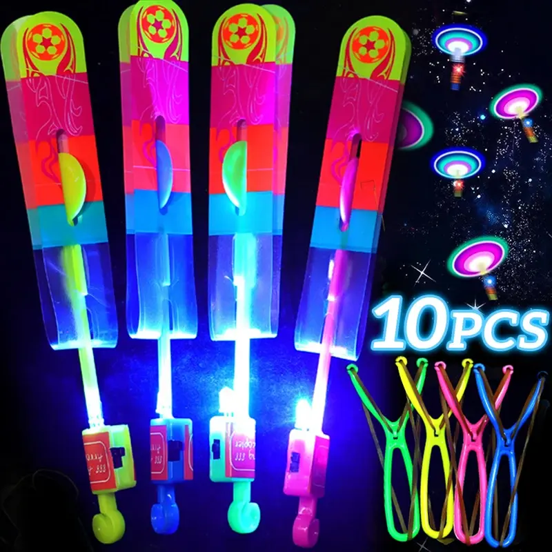 Juguete ligero LED Flechas voladoras Helicóptero Juguetes voladores Luz de flash al aire libre Niños Adultos Banda de goma Catapulta Accesorios de fiesta