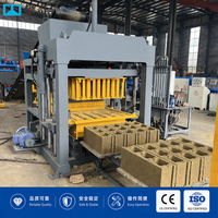 Ligne de production de machines à fabriquer des blocs de béton creux entièrement automatiques à verrouillage hydraulique électrique