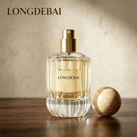 Venta al por mayor en stock: Botella de perfume de vidrio transparente con rayas verticales cilíndricas de 30ml, 50ml, 100ml, botella de perfume vacía con tapa de bola de madera.