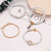 Bracelet tendance en alliage avec pampilles turquoise et pierres en forme de cœur, best-seller transfrontalier, lot de quatre pièces