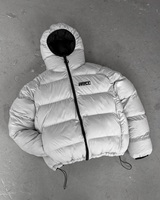 Vestes matelassées imperméables réversibles d'hiver en nylon à capuche de style streetwear fabriquées sur mesure