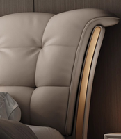 Cadre de lit king size moderne et luxueux en cuir rembourré avec tiroirs de rangement et têtes de lit, assemblé pour un design de mariage