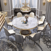 Ensemble de table à manger ronde de luxe moderne Meubles de maison élégants avec marbre artificiel en acier inoxydable pour le salon et l'hôtel