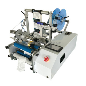Solution d'étiquetage de bouteilles, machine d'étiquetage manuelle pour bouteilles de boissons en verre, machine d'étiquetage semi-automatique abordable pour bouteilles en verre et PET - Product Image 1