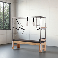 Cadillac en chêne AURA durable, réglable, écologique et peu encombrant avec 6 tensions de ressort pour studio de Pilates et renforcement du tronc