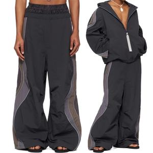 กางเกงวอร์มขาบานทรงหลวมขนาดใหญ่พิเศษ ผ้าไนลอน แต่งแถบลายทาง สไตล์ลำลอง สำหรับผู้ชาย - Product Image 6