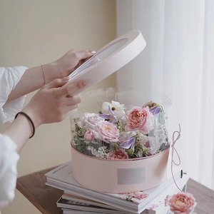 Elegante caja circular de tubo de papel para empaque de regalos florales, se puede personalizar según las necesidades. - Product Image 1