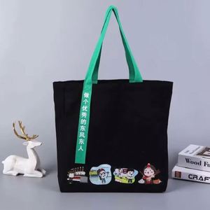 Sac fourre-tout en toile noire personnalisé pour femmes avec imprimé de dessins animés et fermeture à glissière, sac à dos promotionnel - Product Image 3