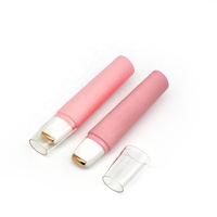 Applicateur en plastique recyclable écologique pour lavage du cou Massage Squeeze Lotion Tube rose mat avec rouleau en métal