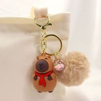 Explosif KapiBala petit cadeau en cuir porte-clés pendentif Couple sac Capybara poupée Machine en peluche porte-clés pour les Couples