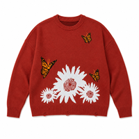 Pull-over pour homme en coton tricoté, col rond, coupe ample, jacquard marguerite et papillon, ourlet effiloché