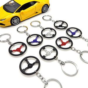 Portachiavi Mini Auto con Griglia Paraurti Anteriore, Volante da Corsa, Modello Testa Cilindro Turbo e Guarnizione Motore - Product Image 3