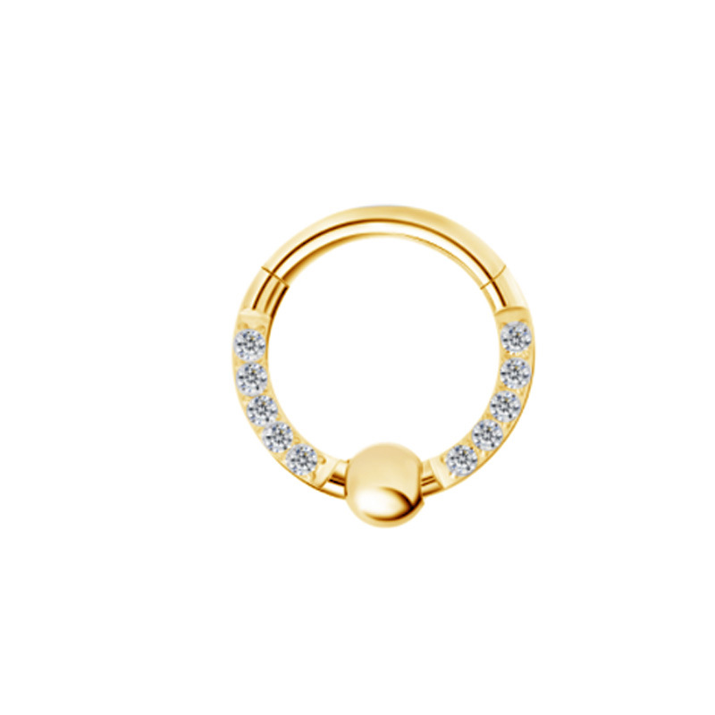 1.2*8mm chapado en oro con pedrería lateral.