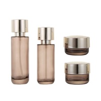Vente en gros directe, logo personnalisé, pots de stockage cosmétiques en verre transparent gris écologiques de 20 ml à 150 ml pour crème pour les yeux et crème pour le visage