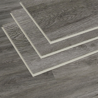 ISO-Zertifizierter Moderner Feuerhemmender SPC-Vinylplanken-Bodenbelag 9mm Fischgrätmuster Rutschfest für Luxus-Villa-Lobby