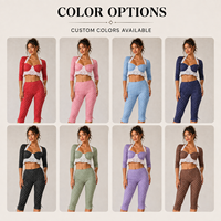Ensemble deux pièces rétro à pois et rayures avec leggings taille haute premium et pantalon capri avec ceinture à fermeture éclair déchirée pour femme