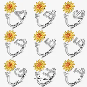 Il girasole regolabile a 26 lettere con apertura alla moda calda può ruotare l'anello di ansia di decompressione per le donne