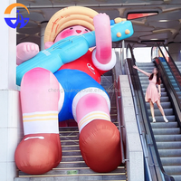 Modèle de personnage de dessin animé gonflable multicolore personnalisé, grand modèle décoratif, accessoire avec ventilateur intégré pour les escaliers des centres commerciaux, les places publiques en plein air