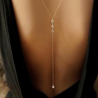 Chaîne de corps en cristal style sexy, collier dos en cristal brillant, harnais de corps doré en strass, bijoux de corps pour femmes et jeunes filles