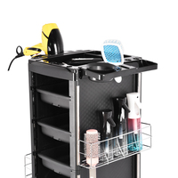 Chariot de rangement professionnel robuste et moderne noir pour salon, avec 4 tiroirs en plastique et roulettes, idéal pour le salon