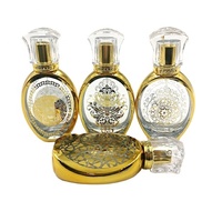 Flacon de parfum rond en verre doré de luxe de haute qualité 50 ml avec diffuseur à bâtonnets, bouchon à vis, gravure et sérigraphie, livraison rapide