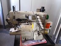 Machine à coudre industrielle informatisée à cylindre pour la production de vêtements en tricot élastique